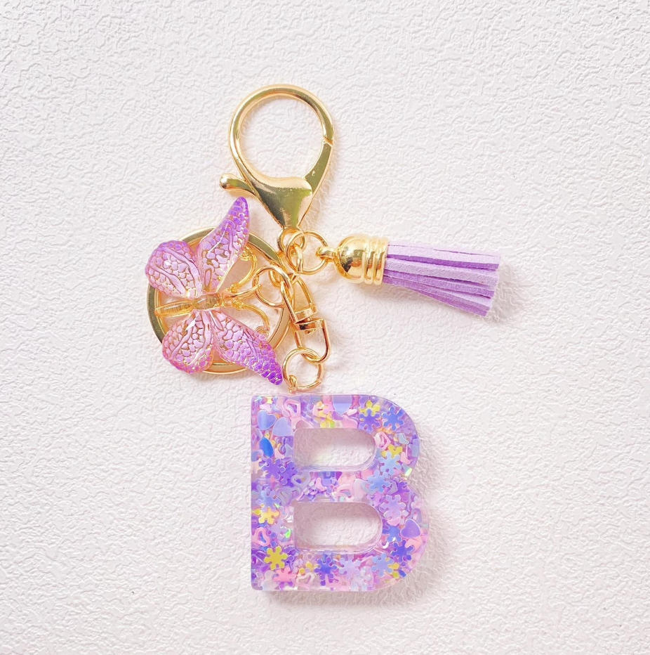 Personalised Resin Initial Keychain with Purple Tassel – Letter B